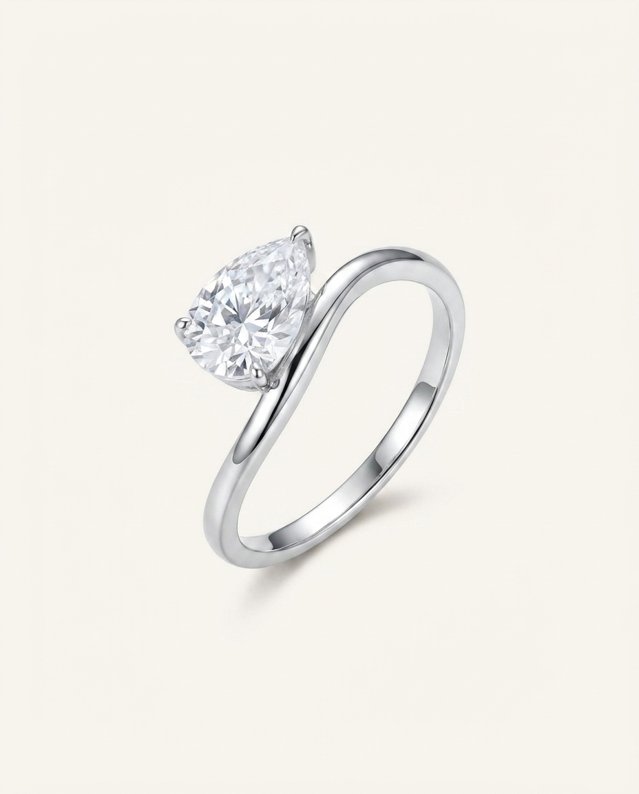 Pear-Cut Moissanite Solitaire Ring with Wave Band – 1.5ct
