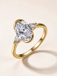 Oval Three-Stone Moissanite Ring with Pear Side Stones – 2.5ct