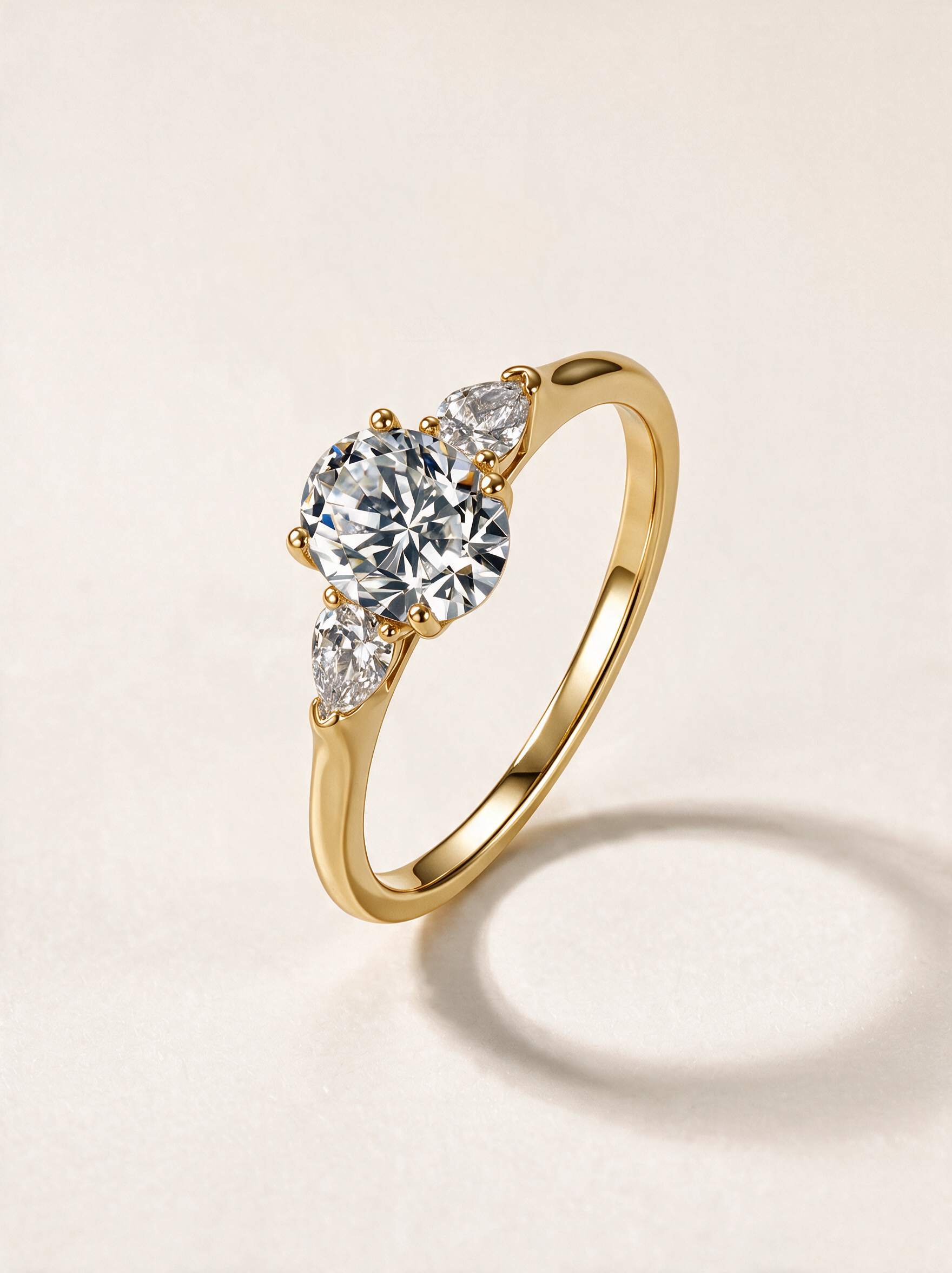 Oval Three-Stone Moissanite Ring with Pear Side Stones – 1.5ct